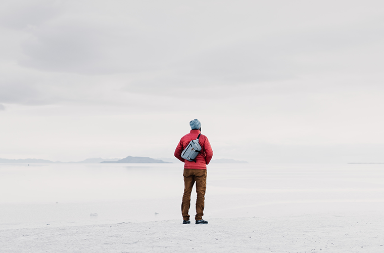 Traveler standing in the middle of nowhere. The search for a UX Design Agency might look bleak if you don't have a process.